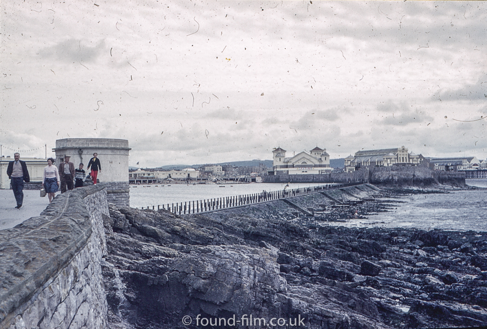 Unknown seaside town with seawall and theatre