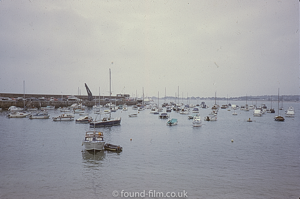 Boats moored in a harbour – July 1975
