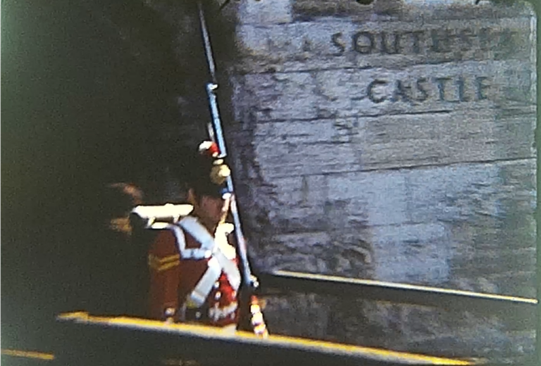 An image showing a man dressed in military uniform at Southsea Castle from a Vintage Home Movie of the 1970s