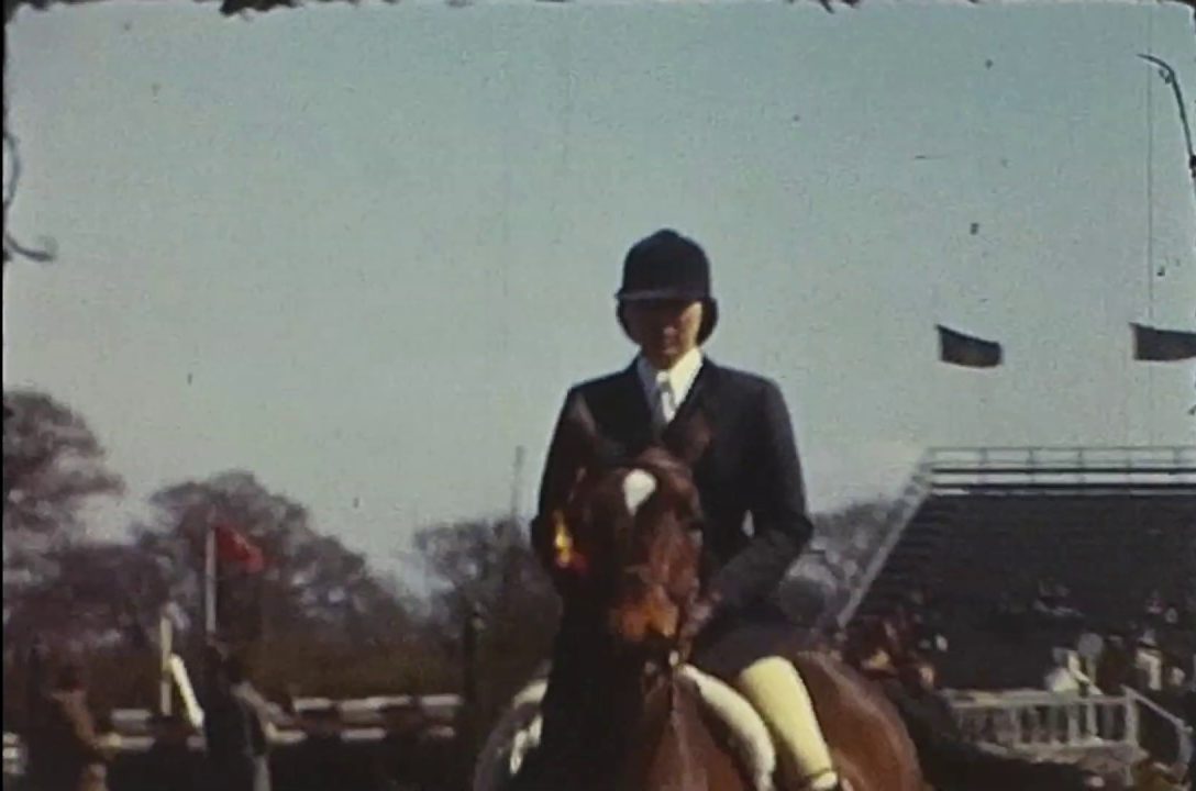 A still image from a vintage home movie shot at the Hickstead showjumping ground in the 1960s