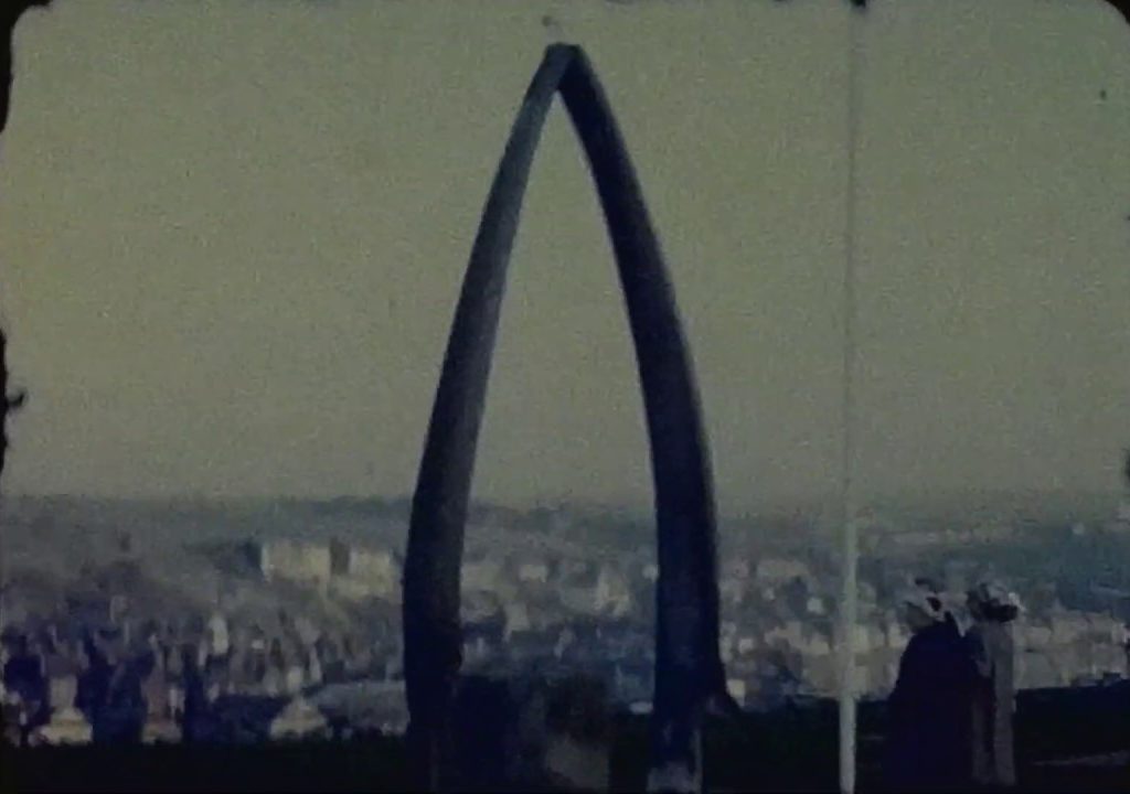 A still image of the famous Whitby Whale Bone Arch from a standard 8 Vintage Home Movie