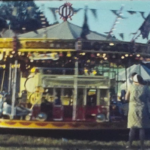 A still image from a vintage home movie shot at a steam fair and circus in 1964