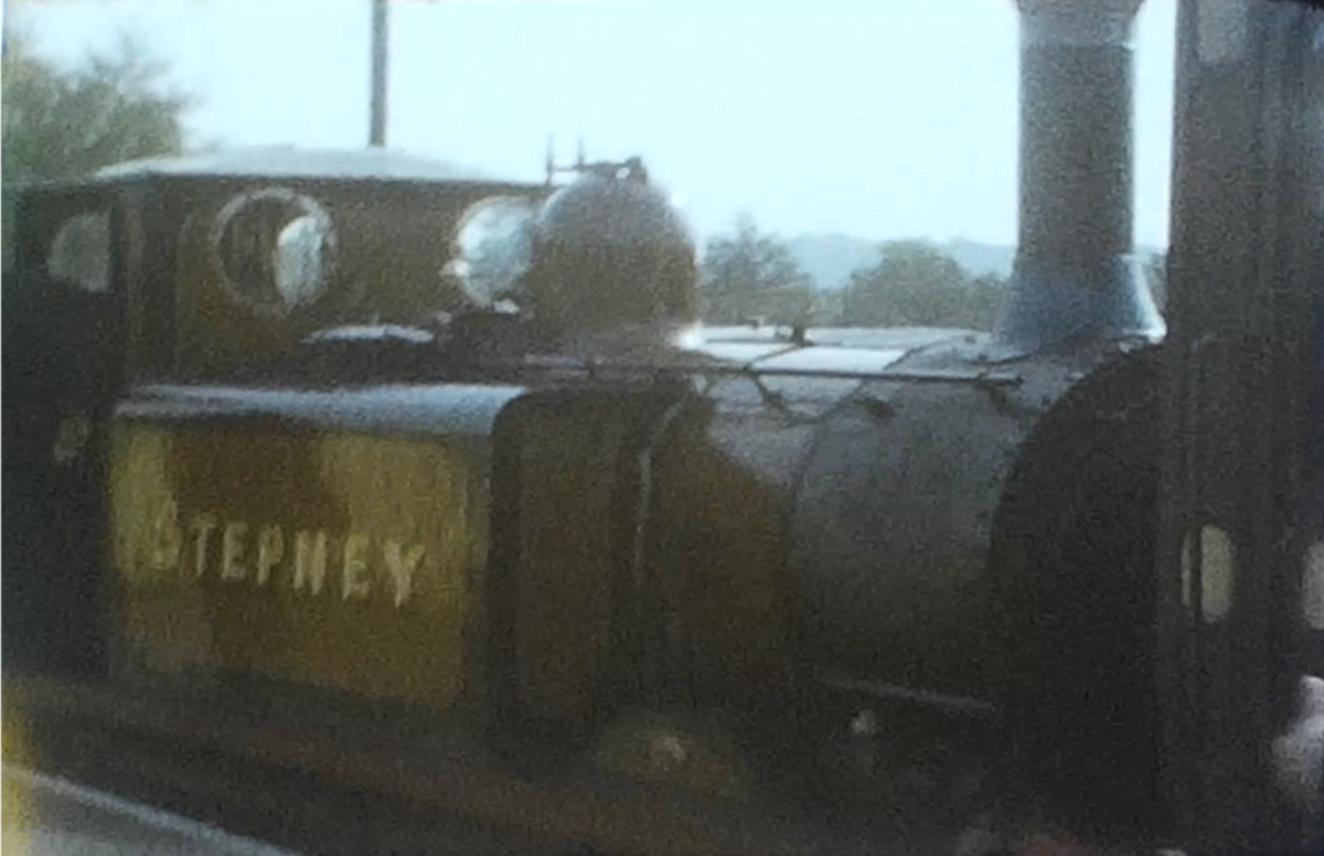 The steam engine Stepney from the Bluebell Line taken from a vintage home movie of 1963