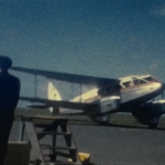 A still from a vintage home movie of a summer holiday in the late 1950s