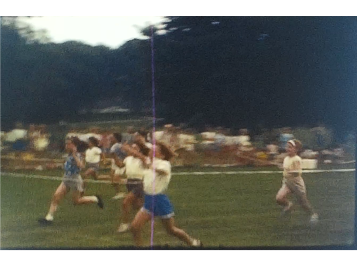 A Still image showing the finish line of a school sports day filmed in 1967