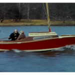 A Still image taken from a vintage home movie showing a trip to Lake Windermere in the 1960s