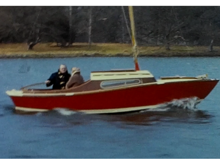 A Still image taken from a vintage home movie showing a trip to Lake Windermere in the 1960s