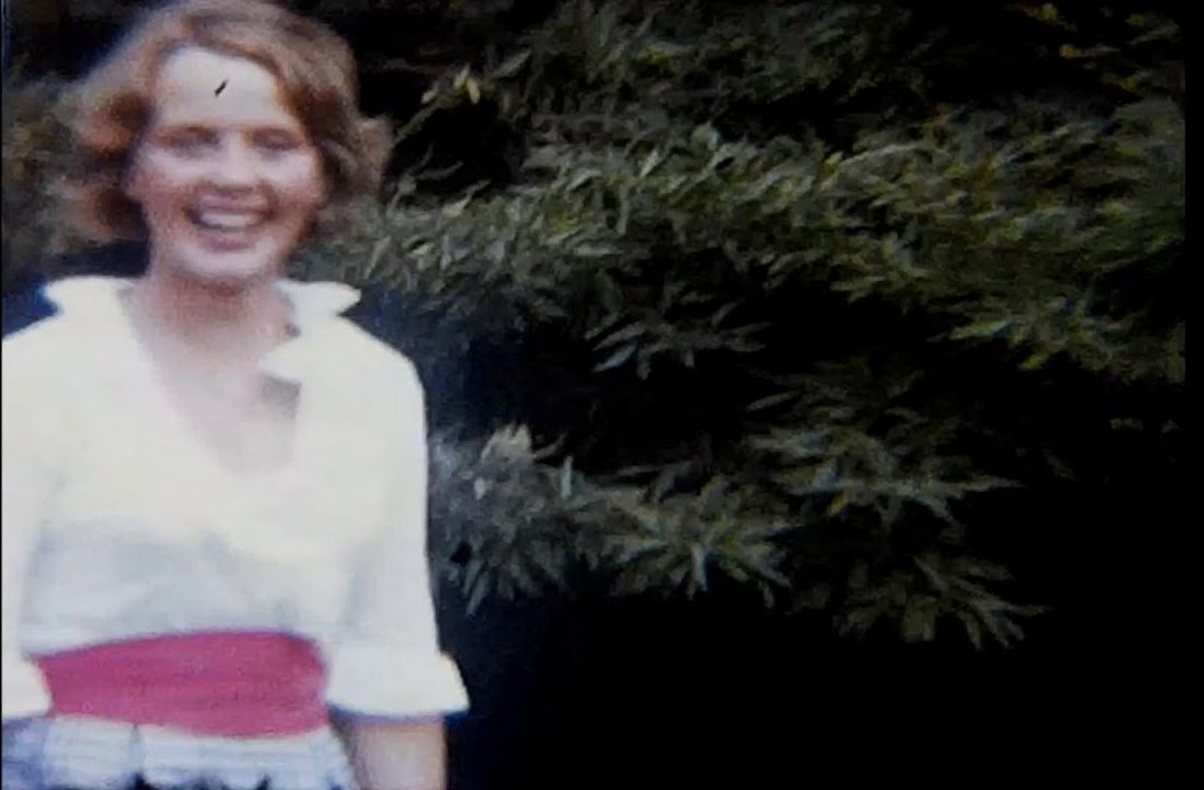 A still image from a vintage home movie taken at a school fete or garden party in the 1970s