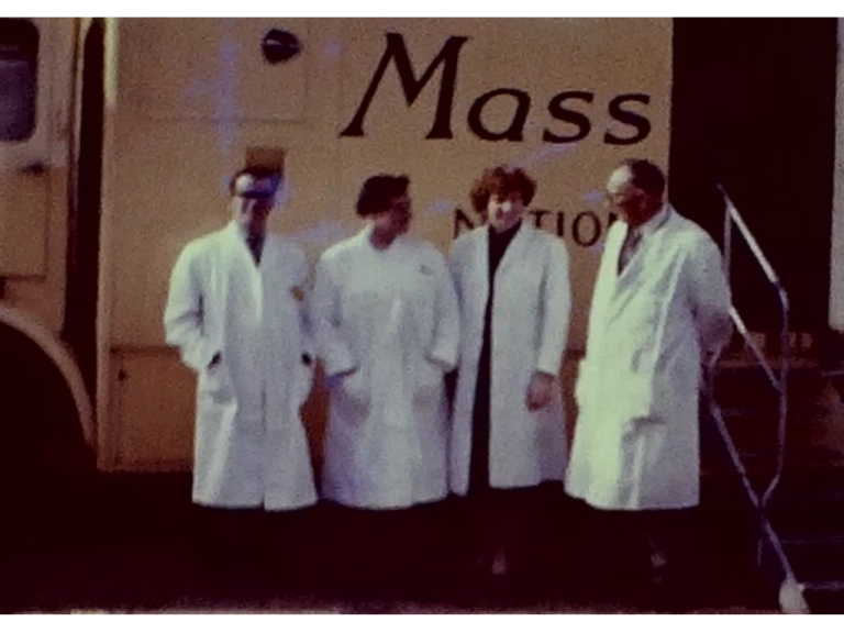 A Still image from a vintage home movie which shows a mobile X-Ray van in the town of St Andrews