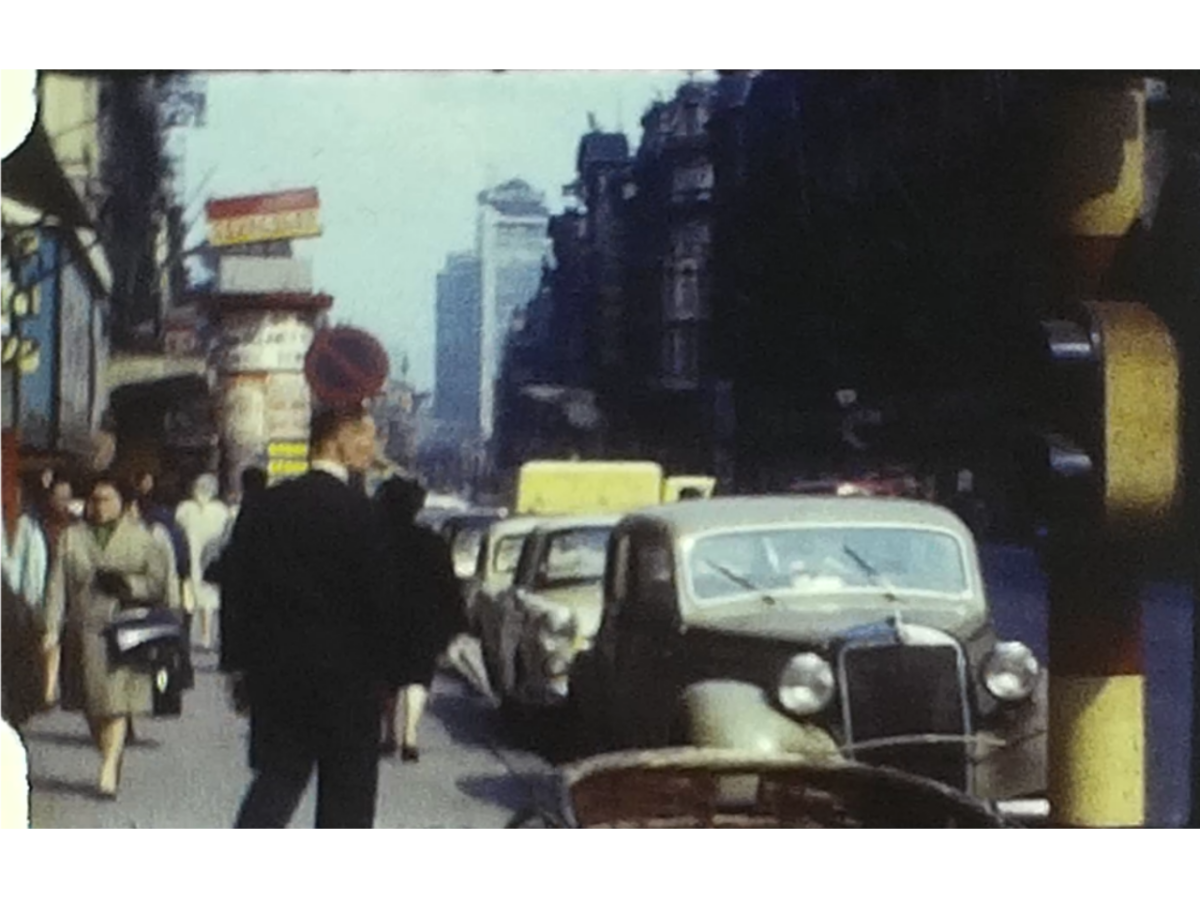 A Still image of a street in Brussels from a vintage home movie