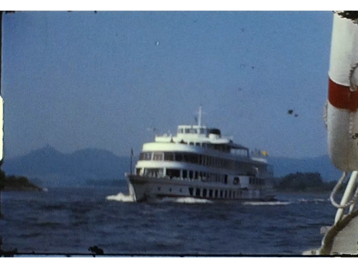 A Still image from a vintage home movie of a river trip on the Rhine river in Germany from the 1970s