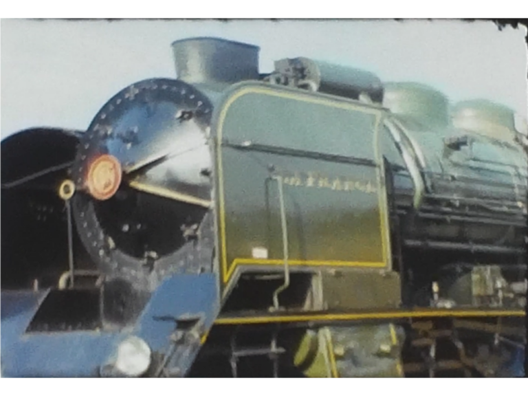 A Railway engine from a vintage home movie showing typical family life from the 1970s