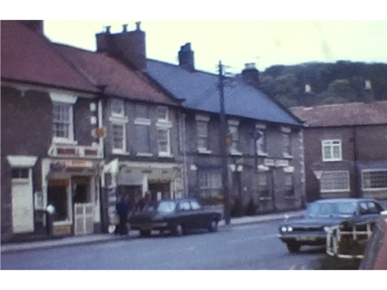 A still image from a vintage home movie shot in a village in Yorkshire in about 1970