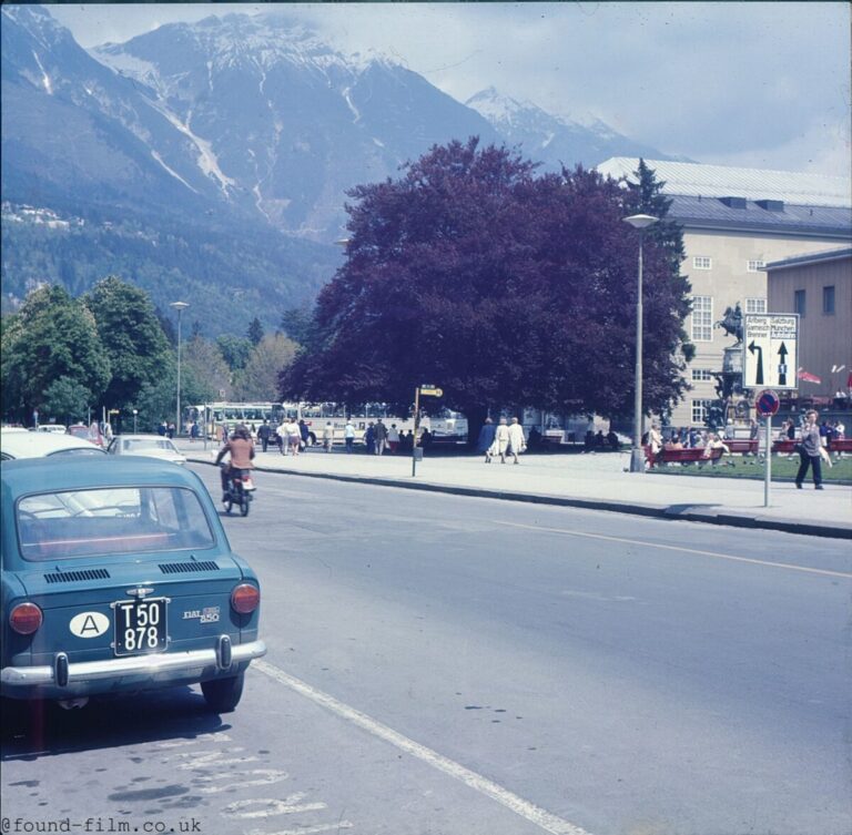 a-fiat-500-car-parked-near-a-european-mountain.jpg