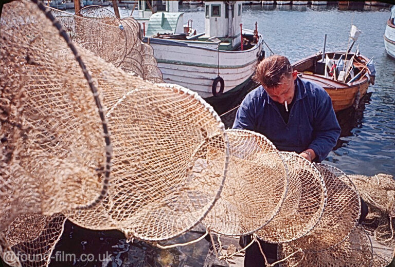 Fisherman mending nets, June 1964