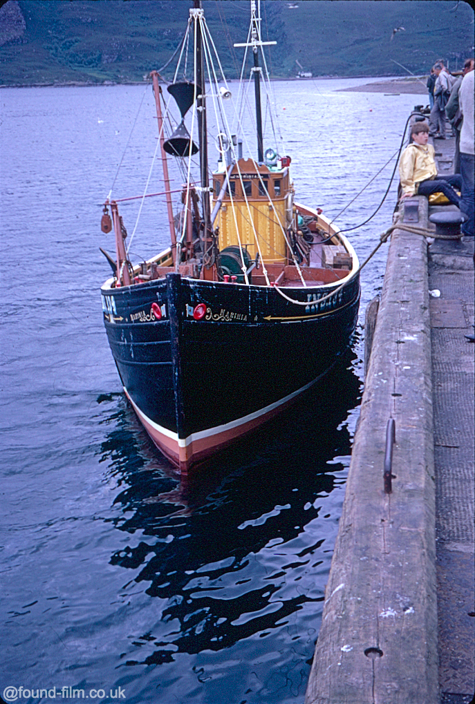 a fishing boat moored by the quay