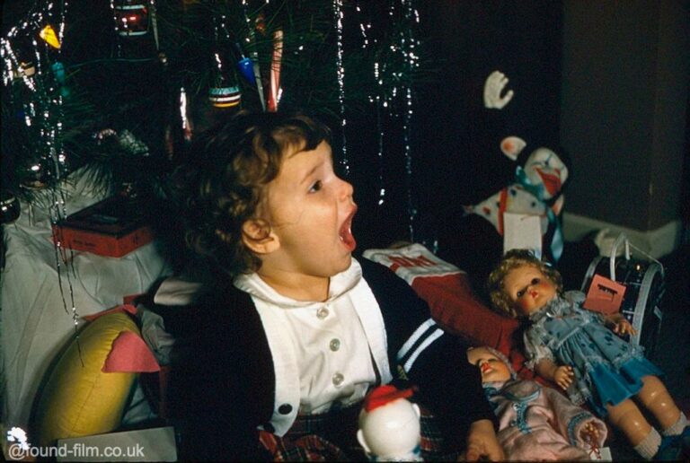 a-small-child-at-christmas-in-the-late-1950s.jpg