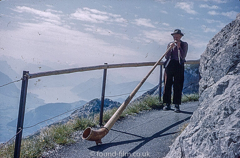 Alpine horn blower on Pilatus range in Switzerland 1962