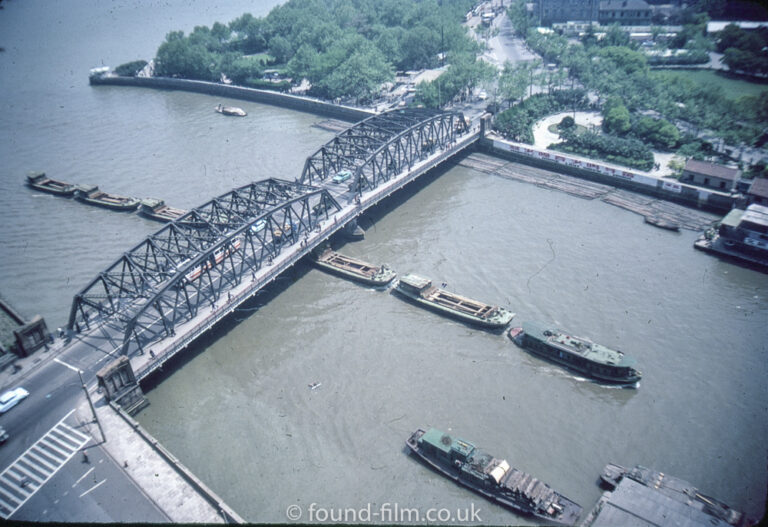 Barges under a bridge