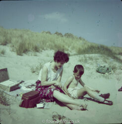 boy and mother on beach