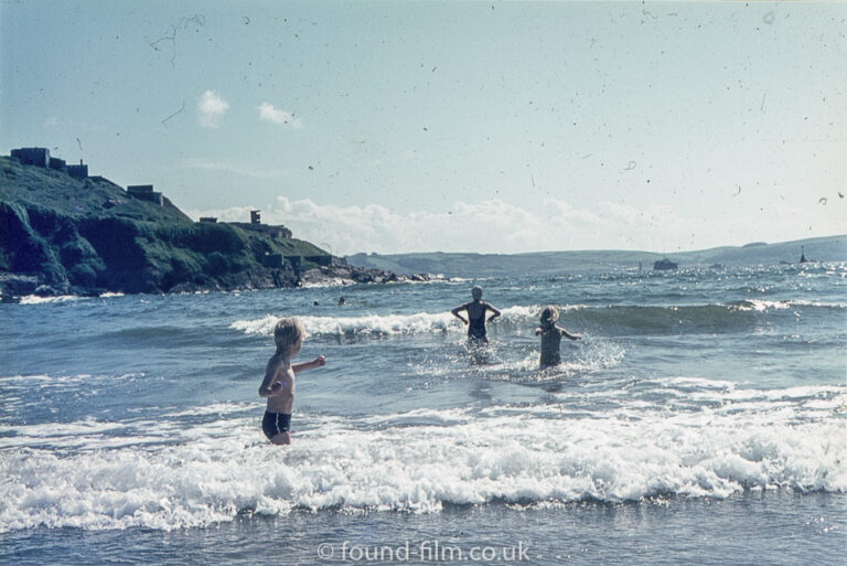 Children playing in the sea