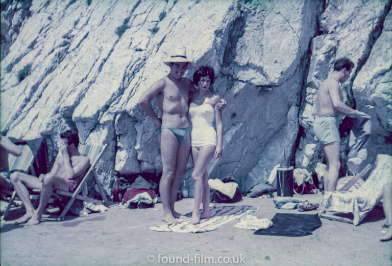 A couple pose at the seaside – possibly mid 1950s