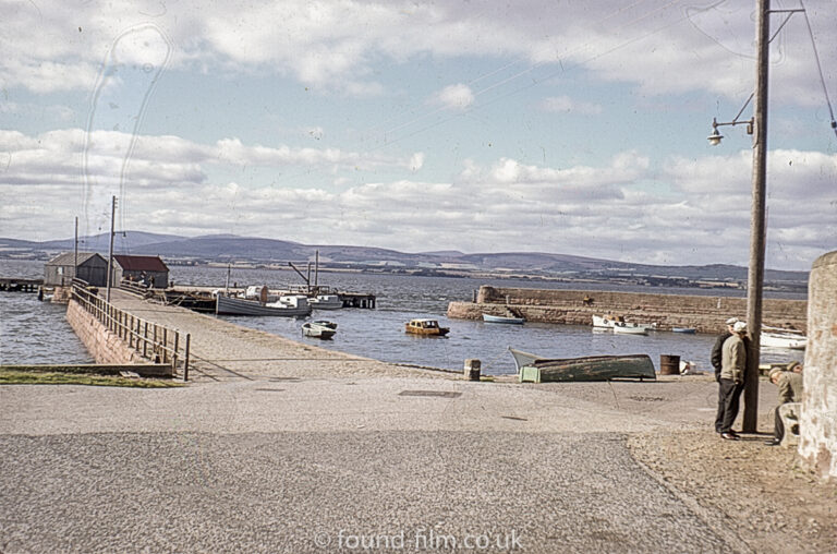 A group of men in Cromarty Harbour in 1967