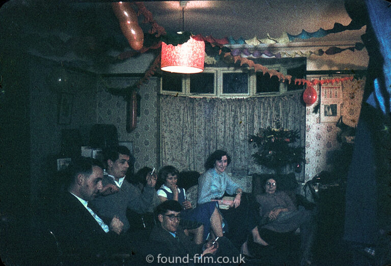 Family at Christmas in their living room