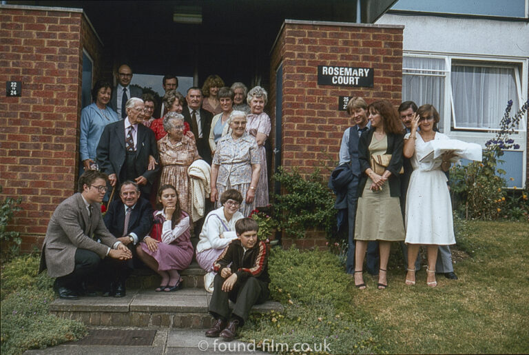 An extended family photo outside at Rosemary Court, High Wycombe