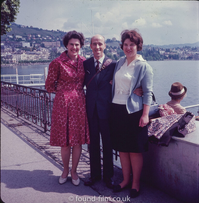 Family group posing at the seaside