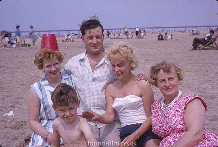 Family group portrait on a beach – July 1963