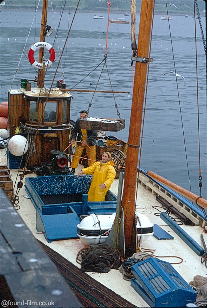 fishermen unloading their catch at ullapool