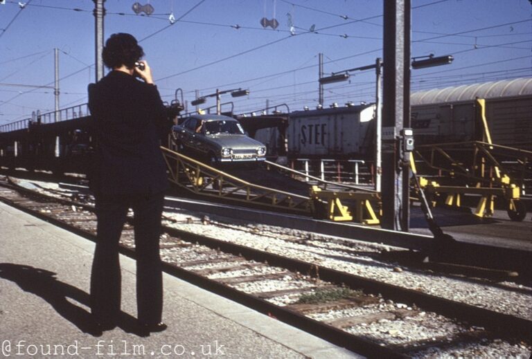 ford-escort-being-driven-off-a-car-train-in-france-1974.jpg