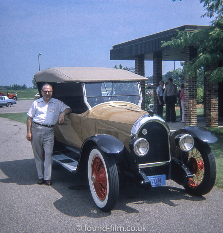 Man in America with a vintage car