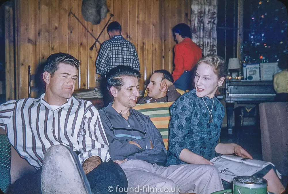 A group of friends on an evening out, probably 1950s