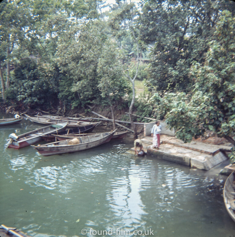 Gathering water from a river in Singapore in the early 1960s