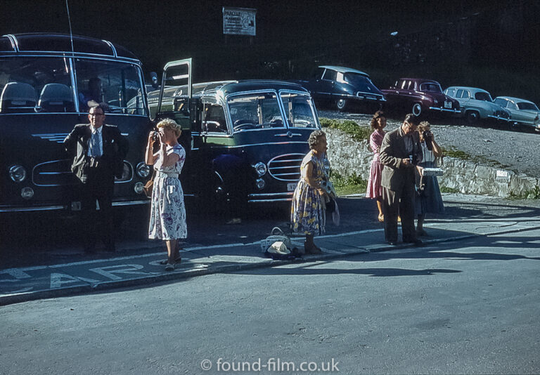 Holiday makers using their cameras in the 1950s