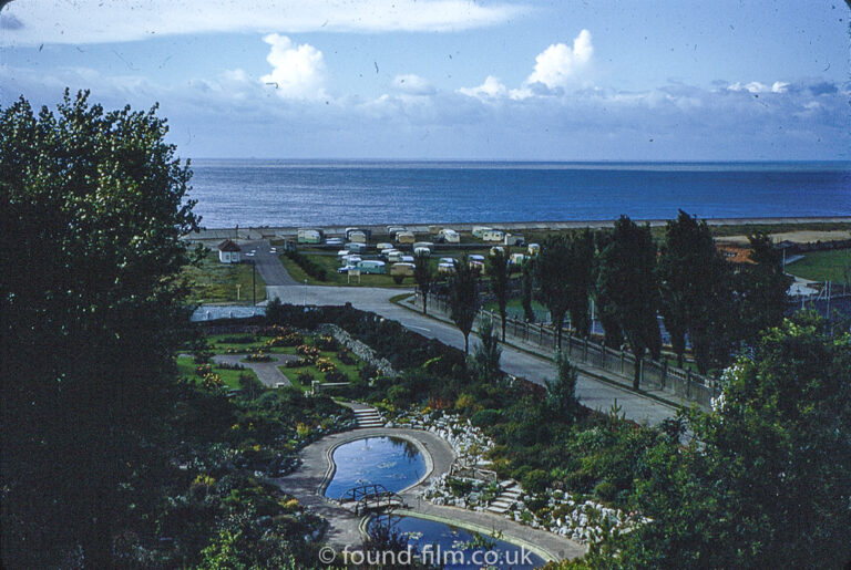 Holiday resort with ruined stone building, August 1969