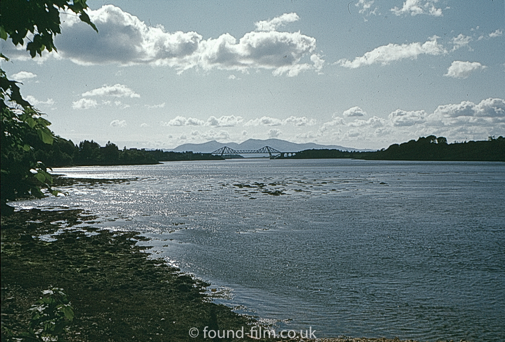 ilford film a shoreline with a cantilever bridge