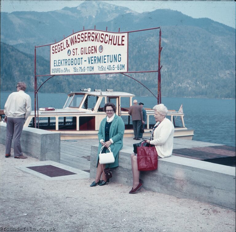 Ladies waiting by a boat at St Gilgen in Austria