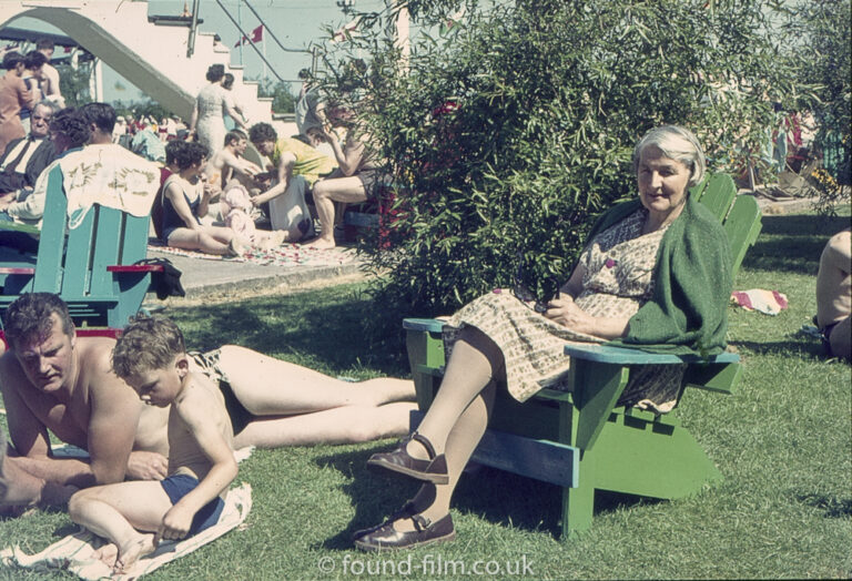 Lady in wooden seat