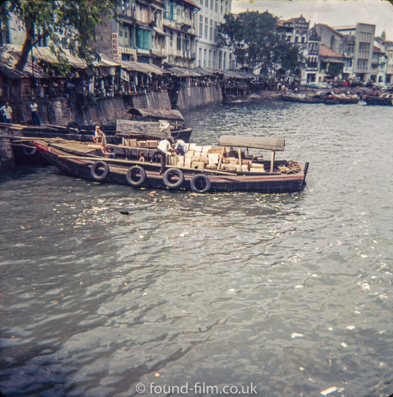 Loading a boat in Singapore harbour in the early 1960s