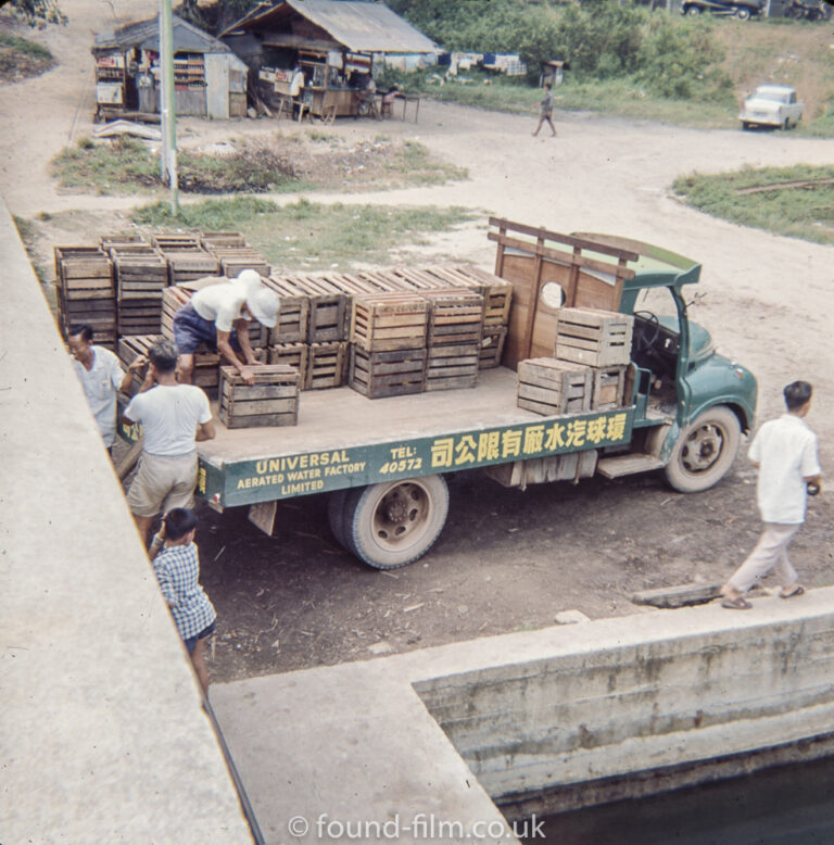 Loading a lorry in Singapore c1965