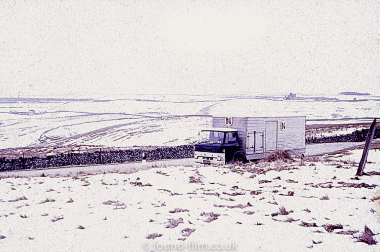 NAFFI Lorry parked on the road in snowy conditions