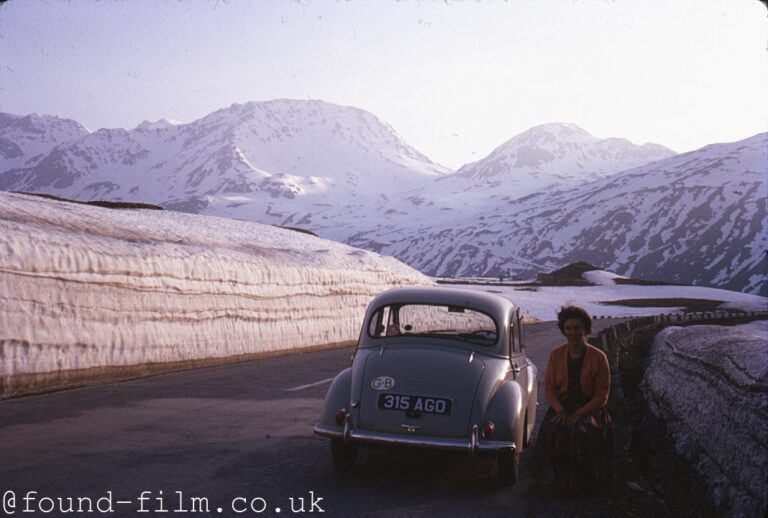 Morris Minor parked on road – about 1964