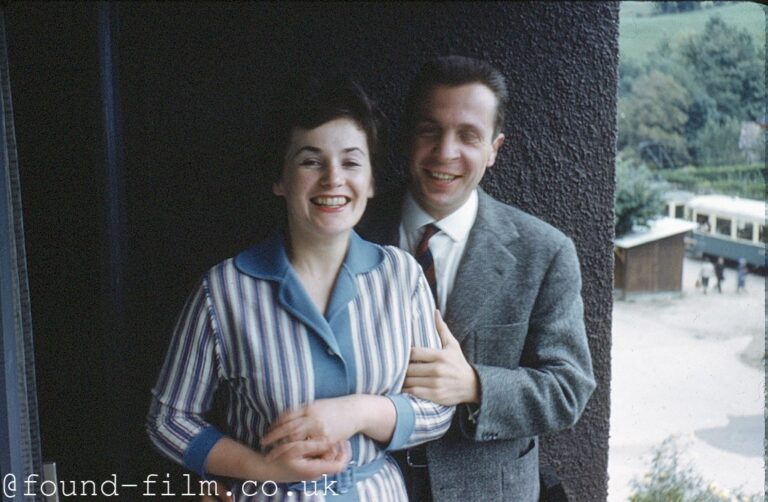 Portrait of a couple standing by a wall, 1959