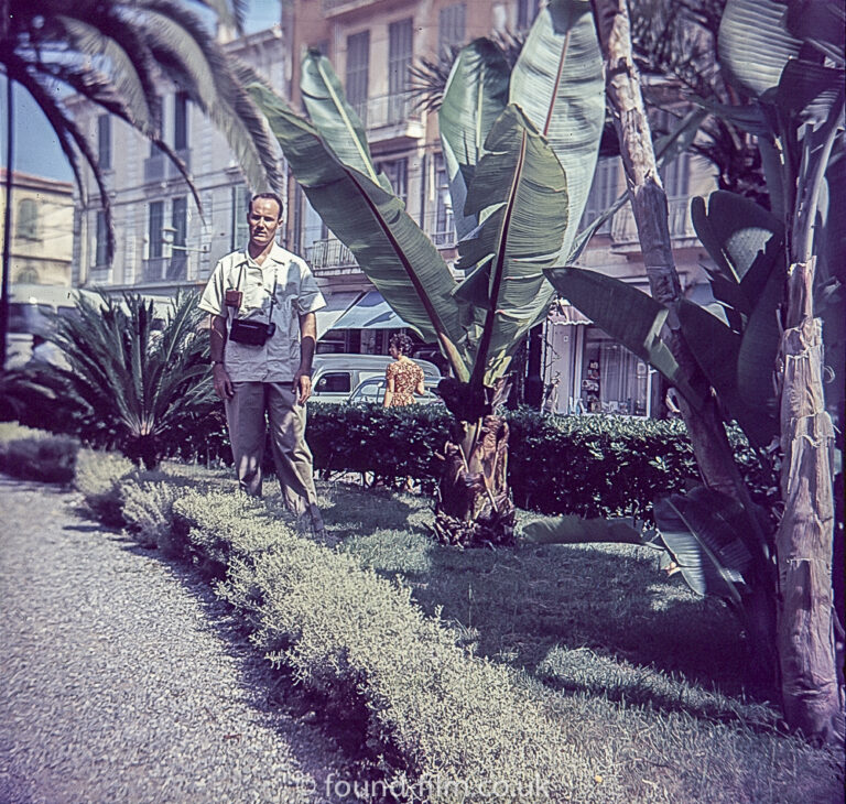 Portrait of a man with a camera in the early 1960s