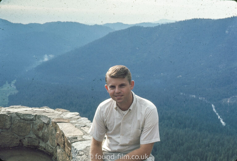 Portrait of a young man in mountains