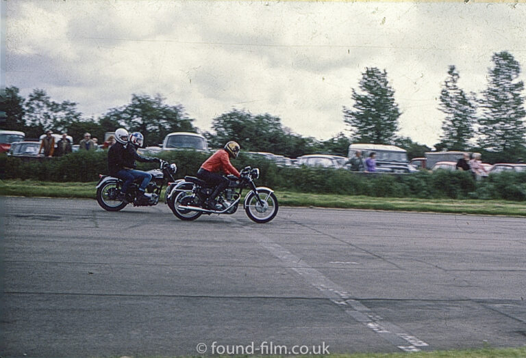 Racing motorbikes crossing the finish line