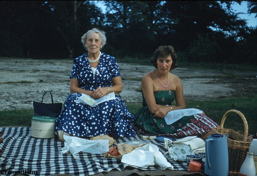 two ladies enjoying a picnic